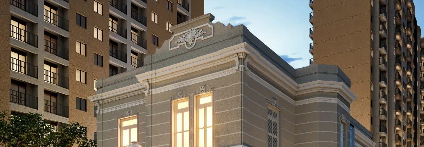 Fachada de prédio com arquitetura clássica e detalhes ornamentais.